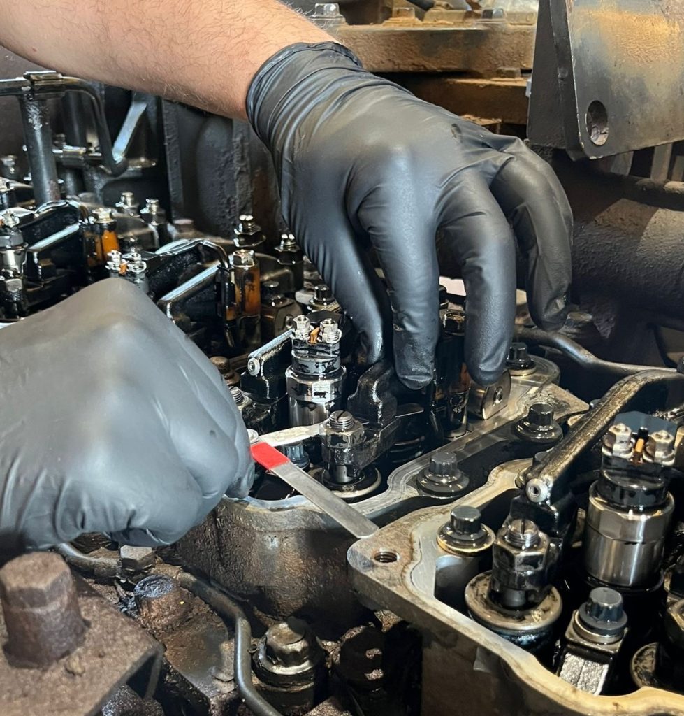 komatsu engine valve adjustment